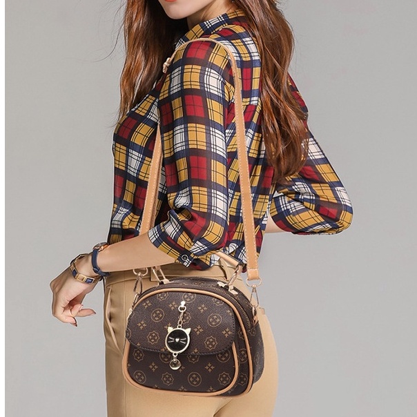 Túi xách nữ thời trang khóa phụ kiện mèo xinh xắn đeo chéo 252