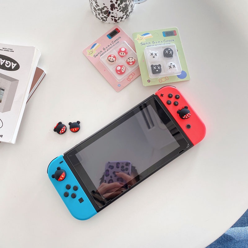 Bộ 4 nắp silicon bọc nút bấm tay cầm chơi game Nintendo lite OLED chất lượng