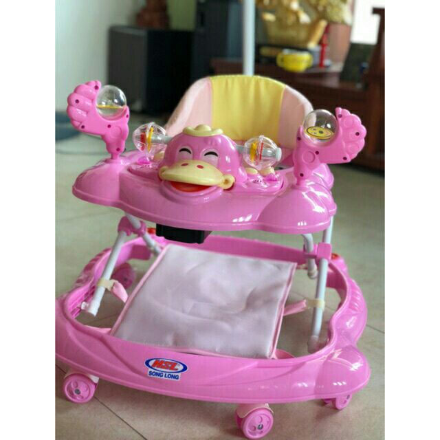 Xe tập đi song long cho bé