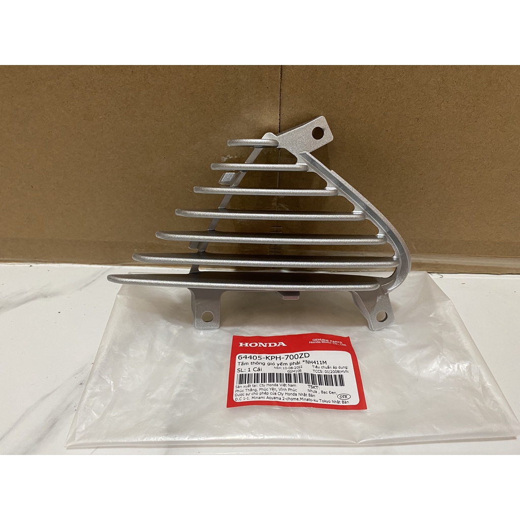 Tấm thông gió yếm phải HONDA FUTURE NEO năm 2005 màu Bạc.