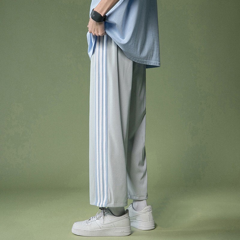 Quần jogger nam nữ ống rộng 4 sọc cực chất