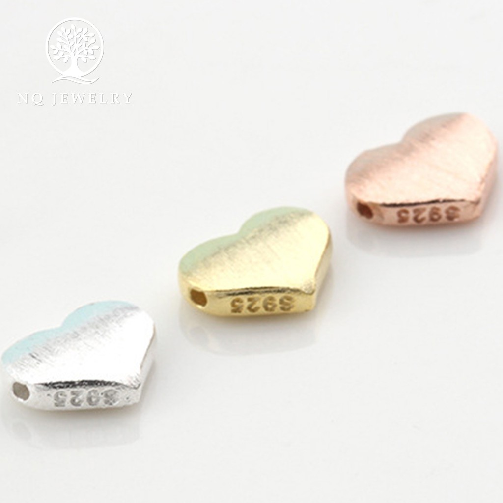 Charm bạc trái tim xỏ ngang - NQ Jewelry