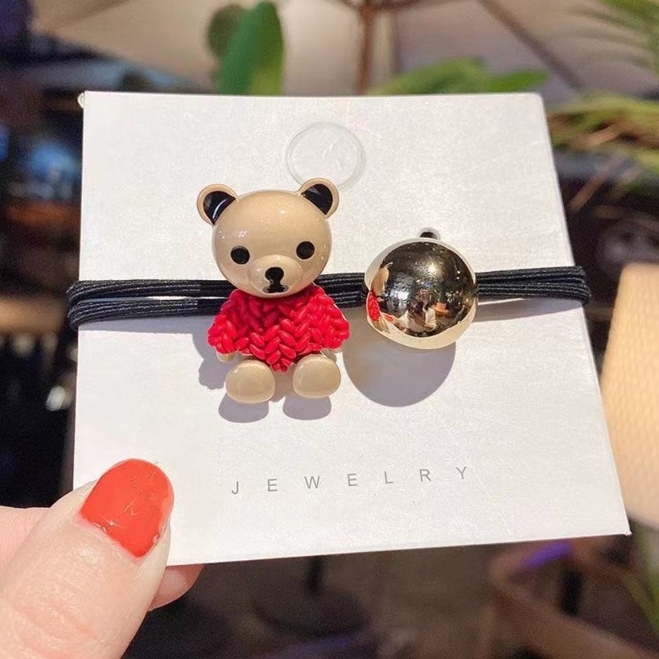 Cột tóc gấu vàng tai đen mặc áo dễ thương CT131