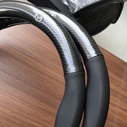 Bọc vô lăng CARBON phối da thoáng khí đủ các hãng xe Toyota-Honda-Hyundai-Mazda-KiA-Ford-Mitshubishi-Chevrolet cao cấp