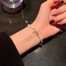 Vòng Đeo Tay Đính Nơ Phối Ngọc Trai Thời Trang Xinh Xắn Cho Nữ
