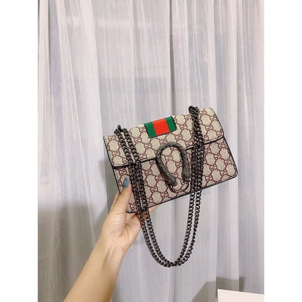 Tui xách nữ đeo chéo hoạ tiết đầu rồng