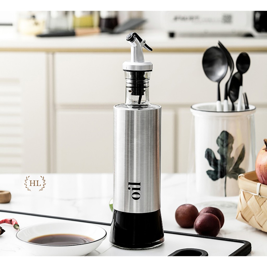 Bình thủy tinh bọc inox đựng dầu ăn, giấm, nước tương, nước mắm, gia vị... có vòi chiết rót thông minh hạn chế quá tay