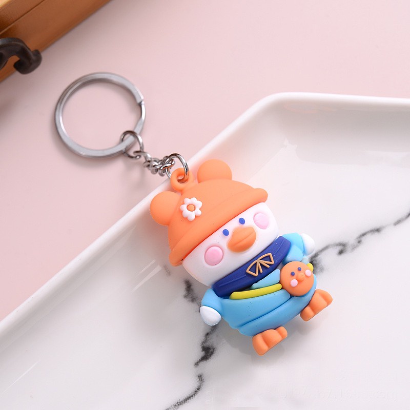 Móc Khóa Hoạt Hình Chú Vịt Đội Mũ Hoa Cute.