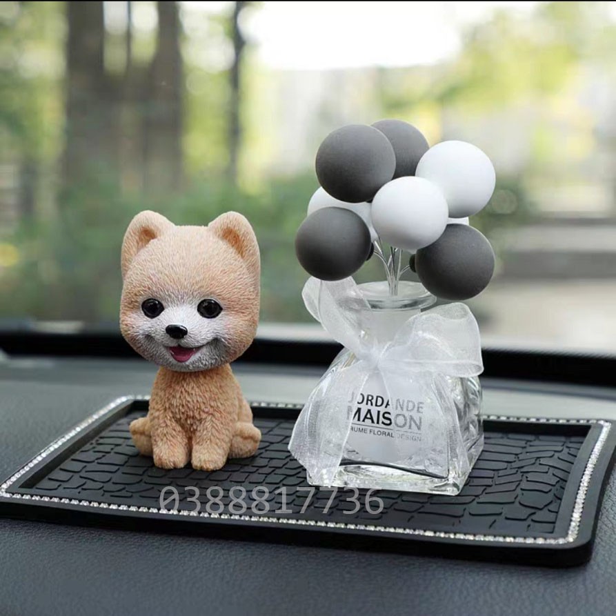 Cún lắc đầu trang trí Taplo ô tô làm từ nhựa cực dễ thương với nhiều kiểu dáng