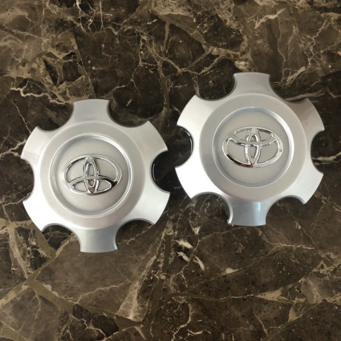 Sản Phẩm Logo chụp mâm, ốp lazang bánh sau xe ô tô Toyota Hilux đời từ 2016 đến 2020 (Đường kính 14cm, cao 4cm) - TY-290