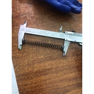 lò xo nén sợi 1,5ly phi 12 dài 105