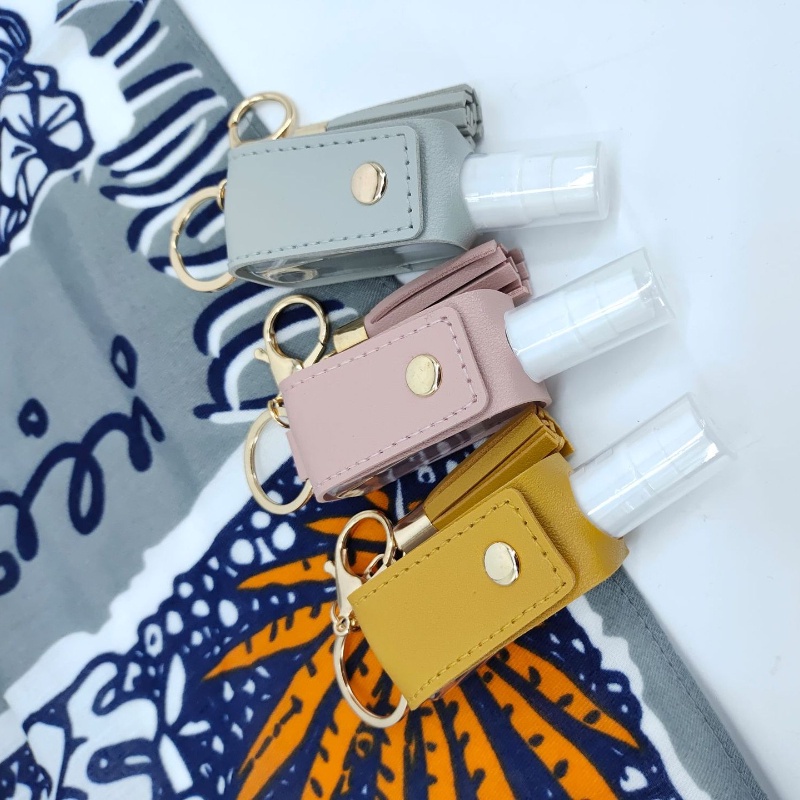 Bình xịt tinh dầu bình xịt mỹ phẩm đựng nước hoa phun sương Chai xịt cồn bọc da có móc khóa tiện dụng 30ml