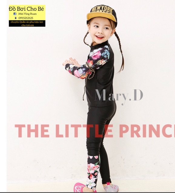 Bộ bơi dài tay hoa trắng và đen | BigBuy360 - bigbuy360.vn