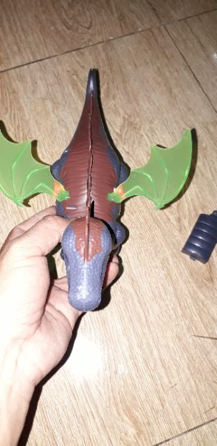 Chú khủng long chạy pin có nhạc và đèn led rất đẹp tặng kèm pin