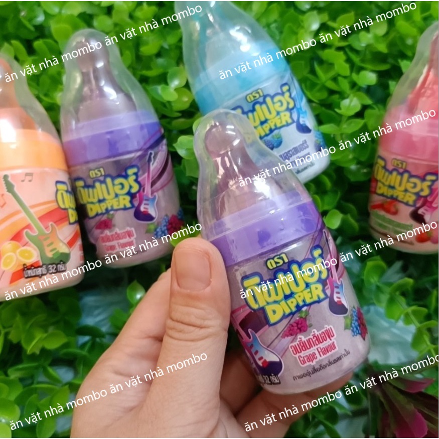 Kẹo bình sữa mút gồm 2 phần kẹo mút và bột sữa Thái Lan hủ 32g