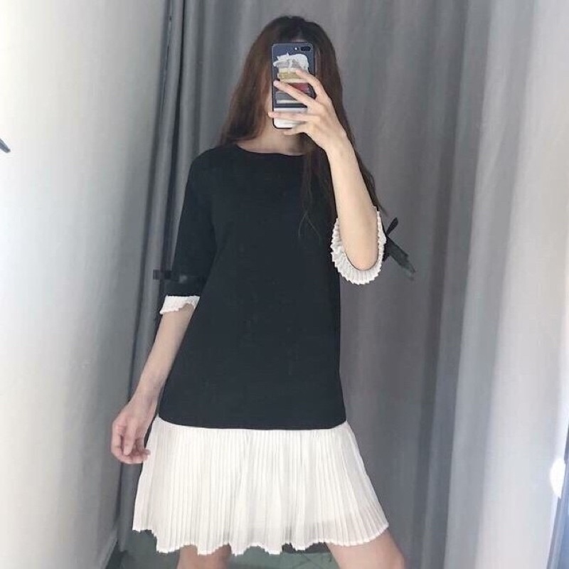 Đầm đen phối li tay ruy băng