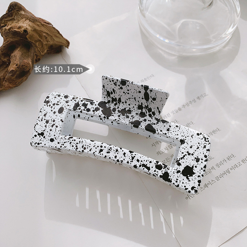 Kẹp tóc hình bò sữa trắng đen phong cách Hàn Quốc