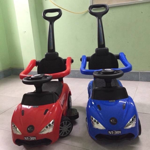 Xe lái ô tô có cần đẩy + nhạc