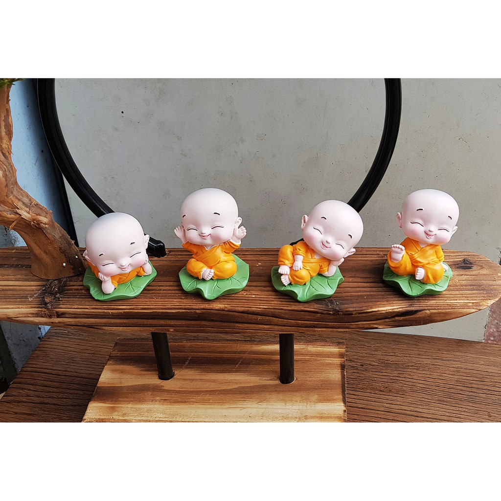 Bộ tượng chú tiểu ngồi trên lá sen thanh tịnh - Mẫu áo vàng