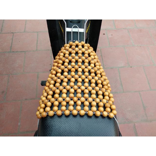Miếng lót yên xe máy hạt gỗ