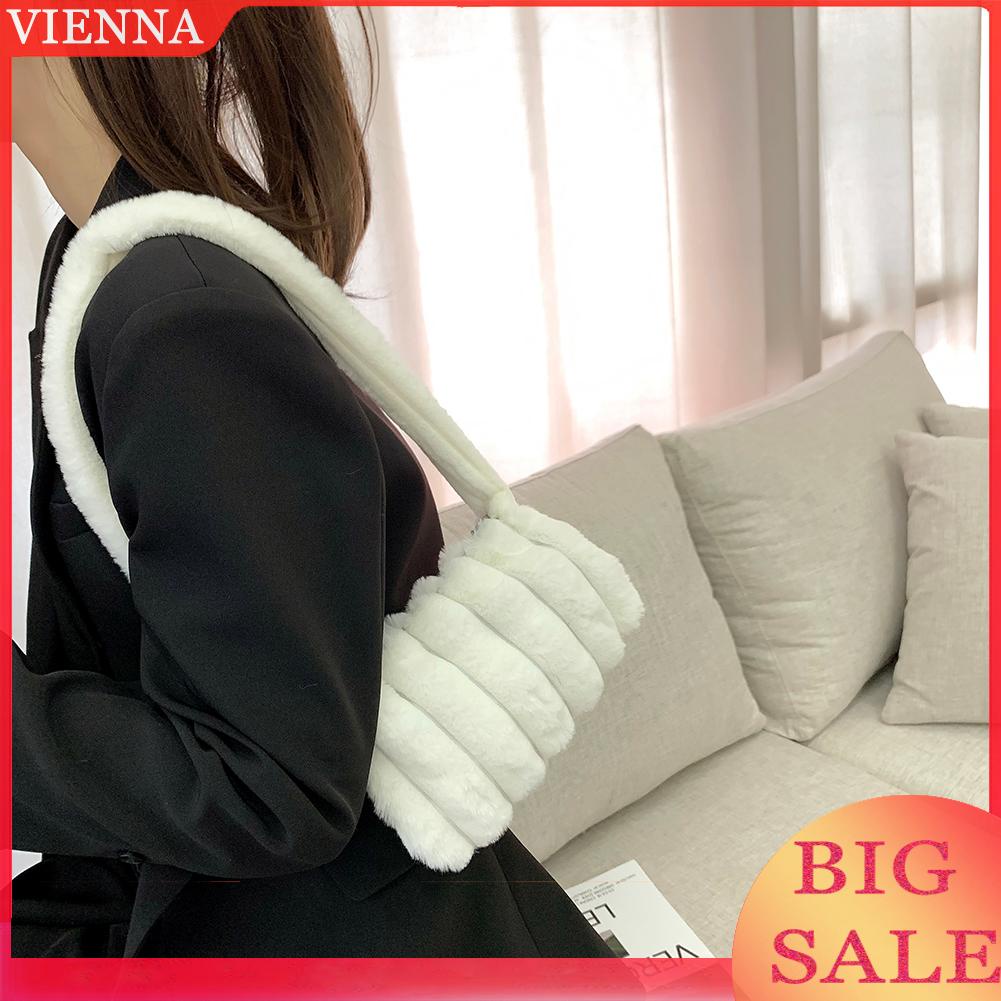 Túi xách kẹp nách vải lông mềm mại họa tiết trái tim phối khóa kéo hợp thời trang