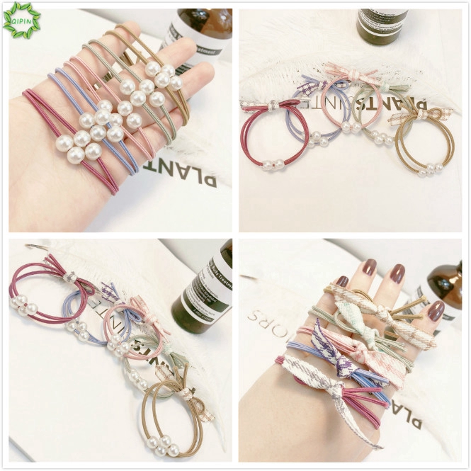 Dây thun buộc tóc đính ngọc trai nhân tạo thắt nơ dễ thương cho bé gái