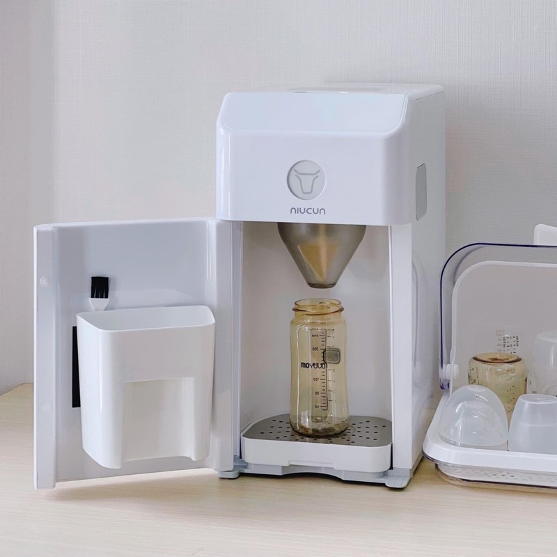 Máy pha sữa NIUCUN PRO có tiệt trùng UV thông minh, sấy khô, pha được tất cả các loai sữa từ 35-70đ