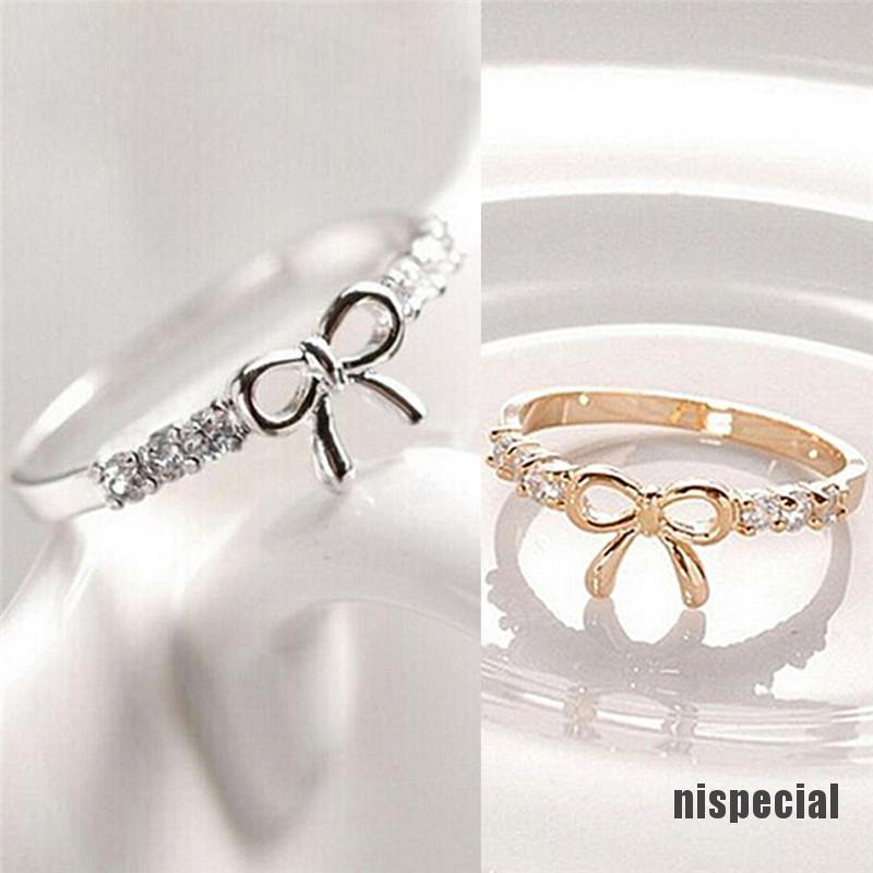 Nhẫn đeo ngón tay thiết kế mặt nơ đính đá pha lê nhân tạo phong cách đơn giản thời trang quyến rũ dành cho nữ