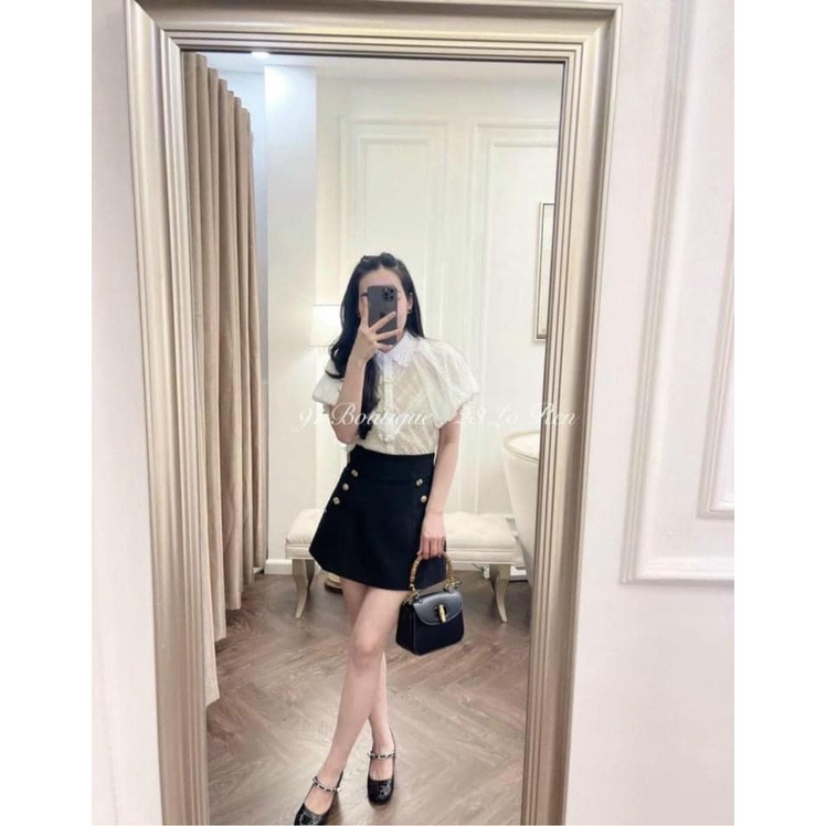 Chân váy chữ A đính cúc hoa