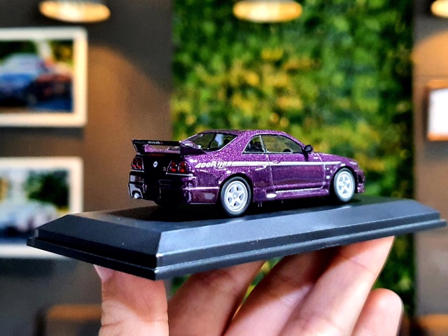 Xe Mô Hình Nissmo 400R 1995 1:64 Car-Nel ( Tím )