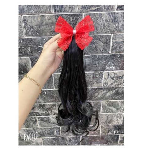 Kẹp tóc nơ xoăn dài cho bé