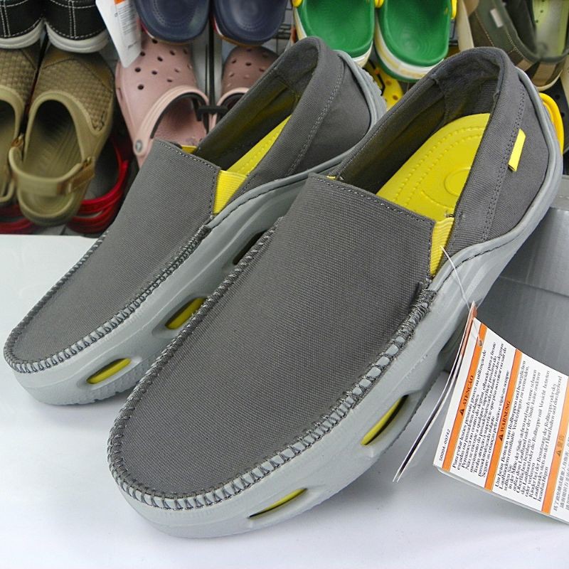 GIÀY  LƯỜI VẢI  CROSS TIDELINE SLIP ON CHO NAM MÀU XÁM