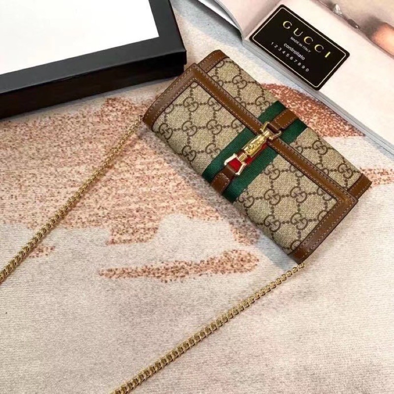 Túi đeo chéo hoặc ví cầm tay Gucci GG da thật cao cấp