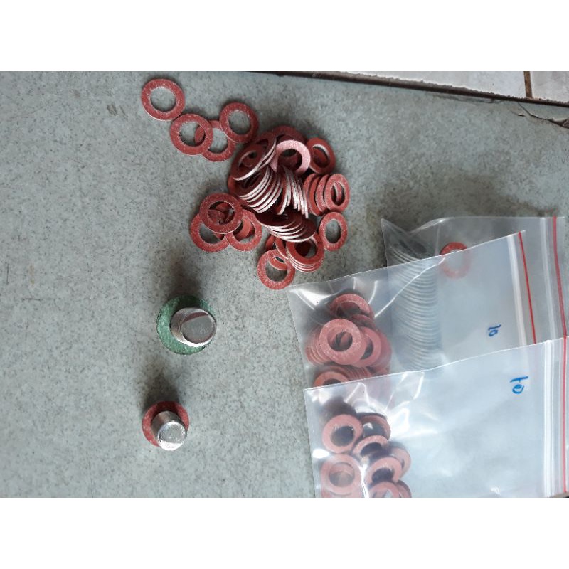 Long đền ,vòng đệm ốc xả nhớt xe máy. SATRIA, RAIDER .bịch 20 cái