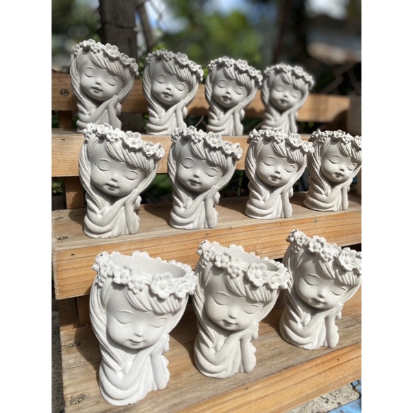 Chậu xi măng cô gái nhỏ  SP044