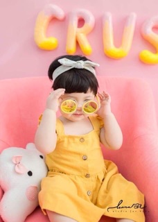 Đầm next vàng linen bé gái