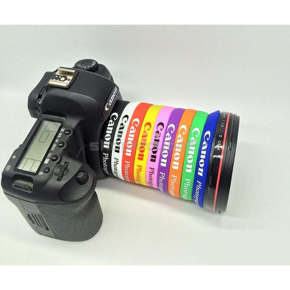 Vòng cao su đeo lens in chữ canon trang trí máy ảnh - nhiều màu sắc