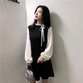 Váy đen phối tay sơ mi cổ nơ