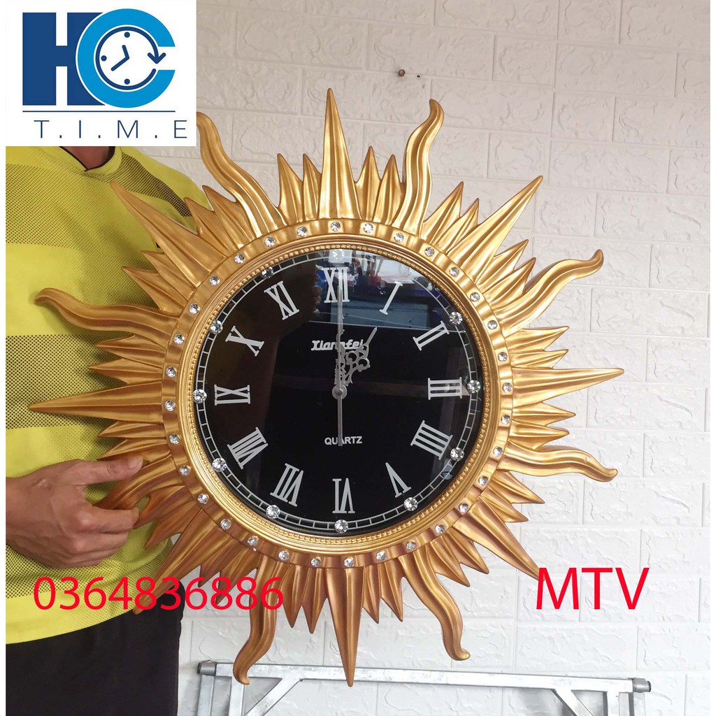 Đồng hồ treo tường trang trí cao cấp  Ông Mặt Trời MTV kích thước 65 cm