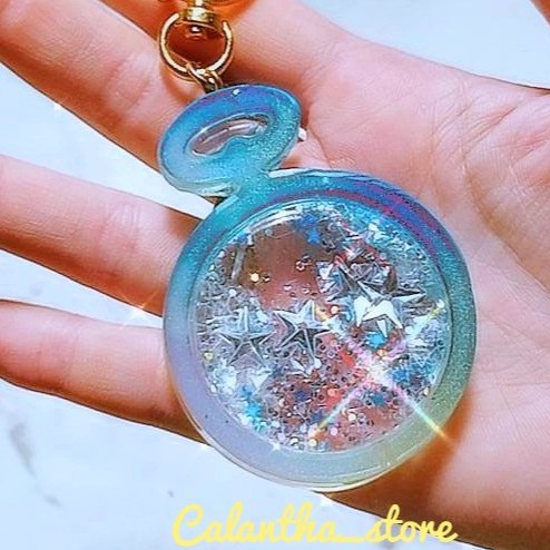 Móc khóa dạng đồng hồ bên trong có charms lắc được (không có nước) - shaker resin keychain - có video