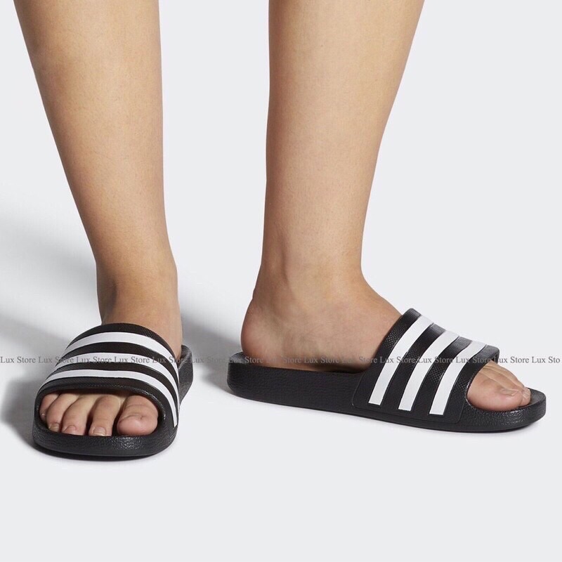 Dép quai ngang dép nam kiểu kẻ ngang đế nhẹ chống trơn trượt cao 3cm.Đức Nội Shop