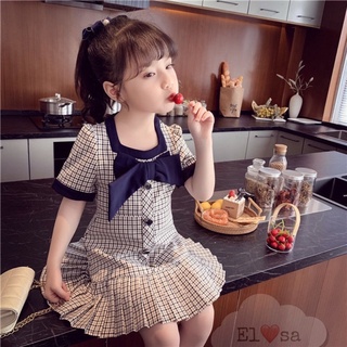 Váy kẻ caro cổ nơ cho bé gái