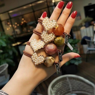 cột tóc đính đá hình trái tim đẹp sang