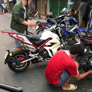 cánh chim liền mỏ cày gắn cho Tnt