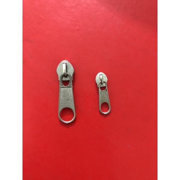 đầu khoá/ củ khoá gắn dây kéo răng cước