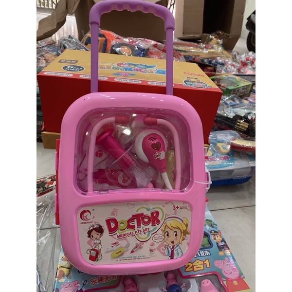 Bộ đồ chơi Bác Sĩ vali kéo màu xanh và hồng có pin cho bé