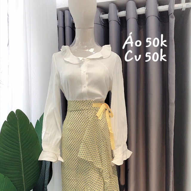 Áo trắng cổ sen tay bèo