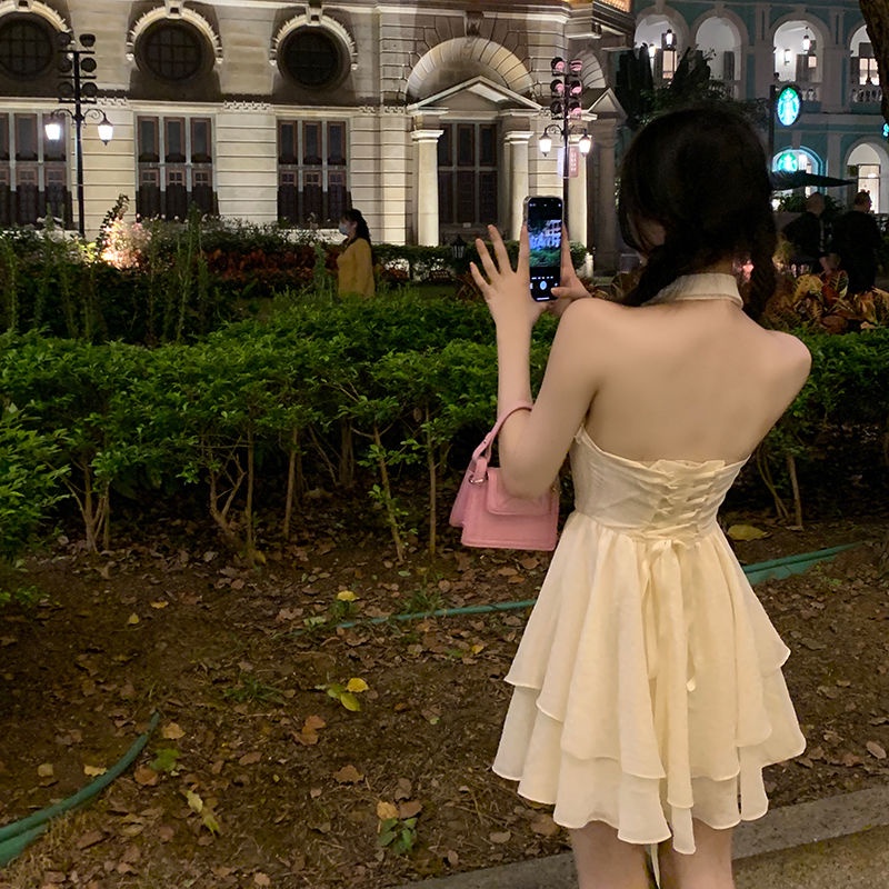 Đầm Ngắn Hai Dây Hở Lưng Đính Nơ Gợi Cảm Thời Trang Mùa Hè Hàng Mới Dành Cho Bạn Nữ