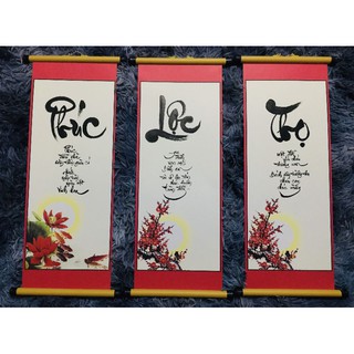 Tranh thư pháp treo trang trí Tết.