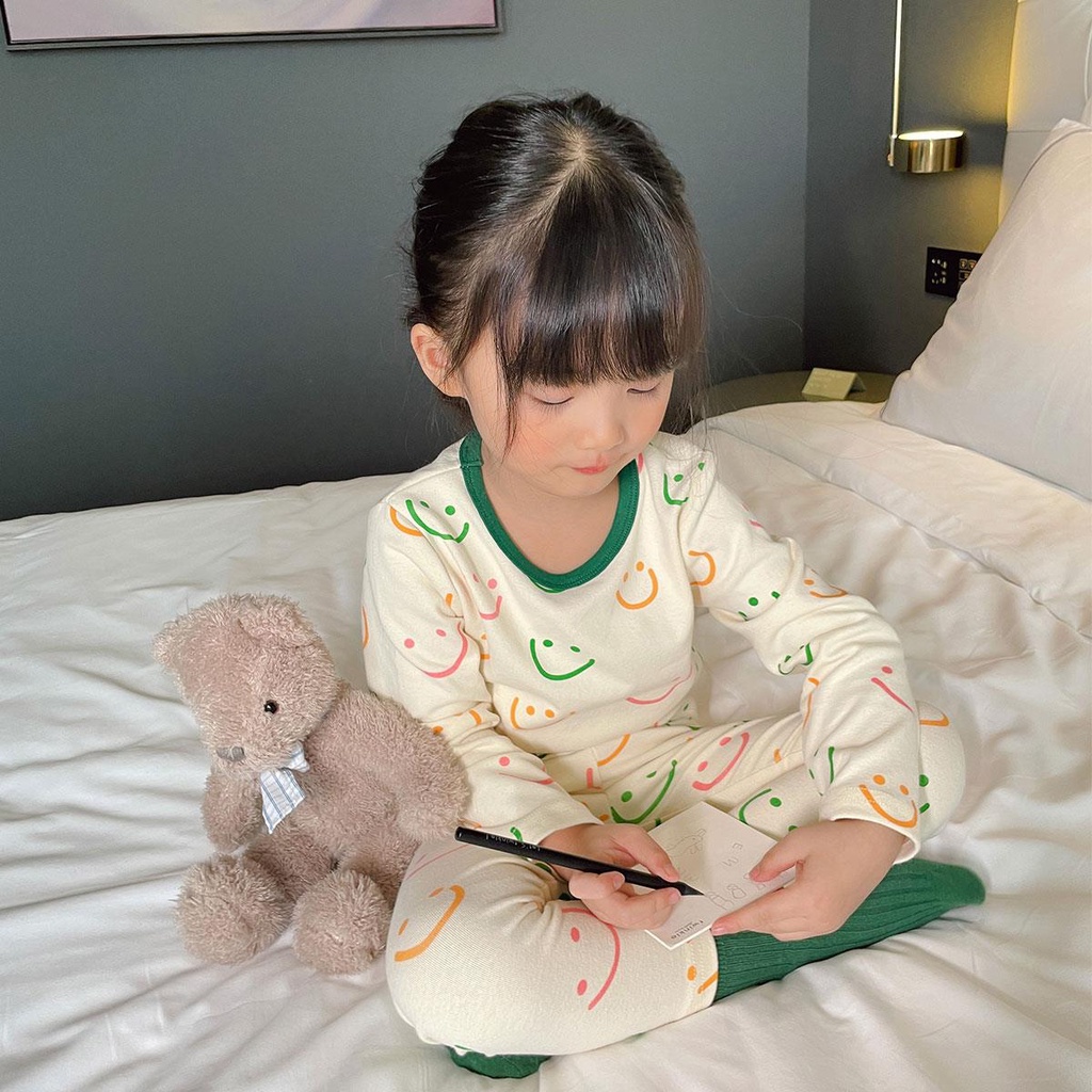 Bộ áo thun tay dài và quần dài in hình mặt cười cho trẻ sơ sinh